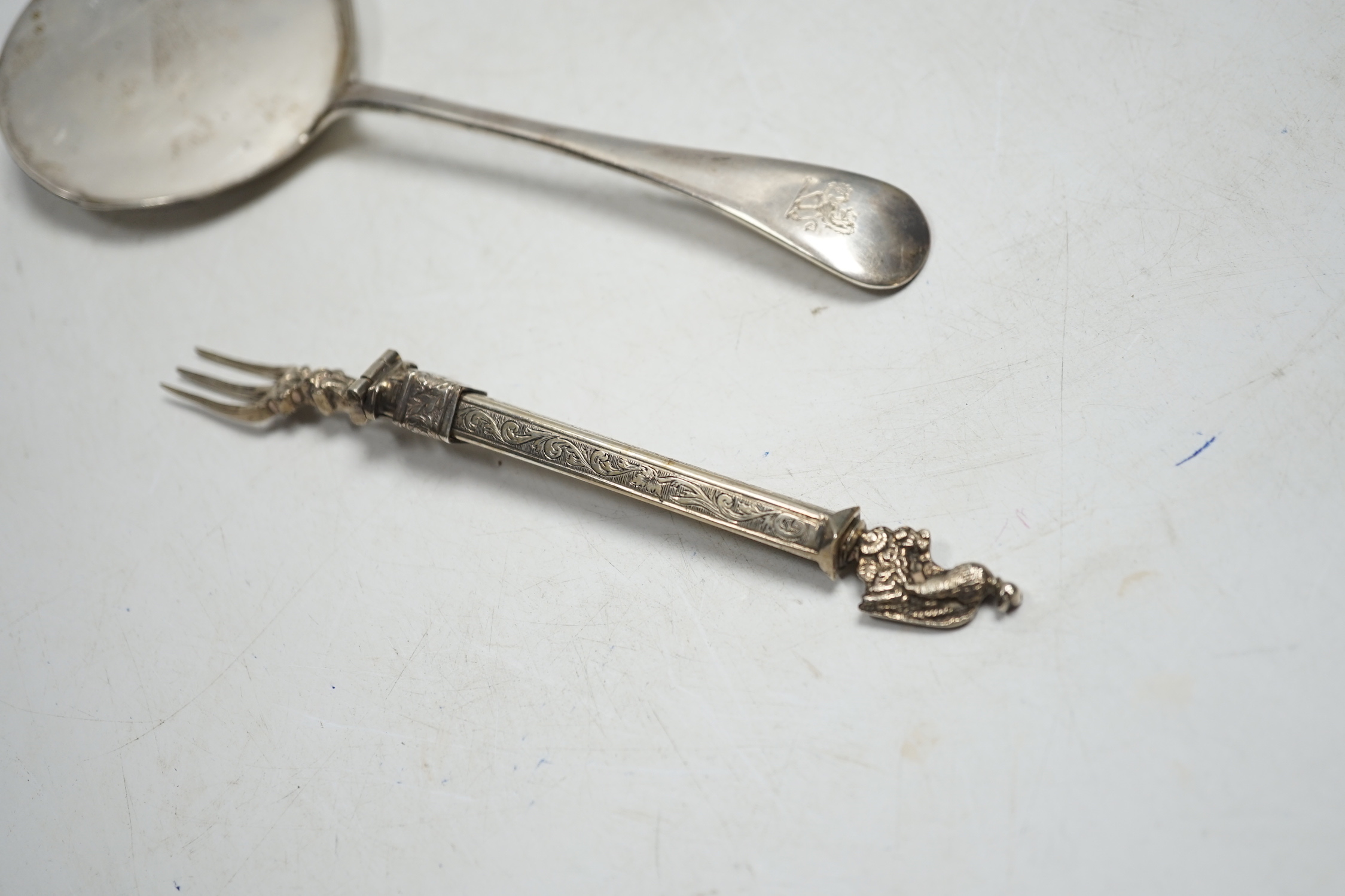 A George V silver biscuit server, a Dutch white metal combination fork and spoon and a late Victorian silver hunting horn, by Sampson Mordan & Co, London, 1900?, 30.2cm.